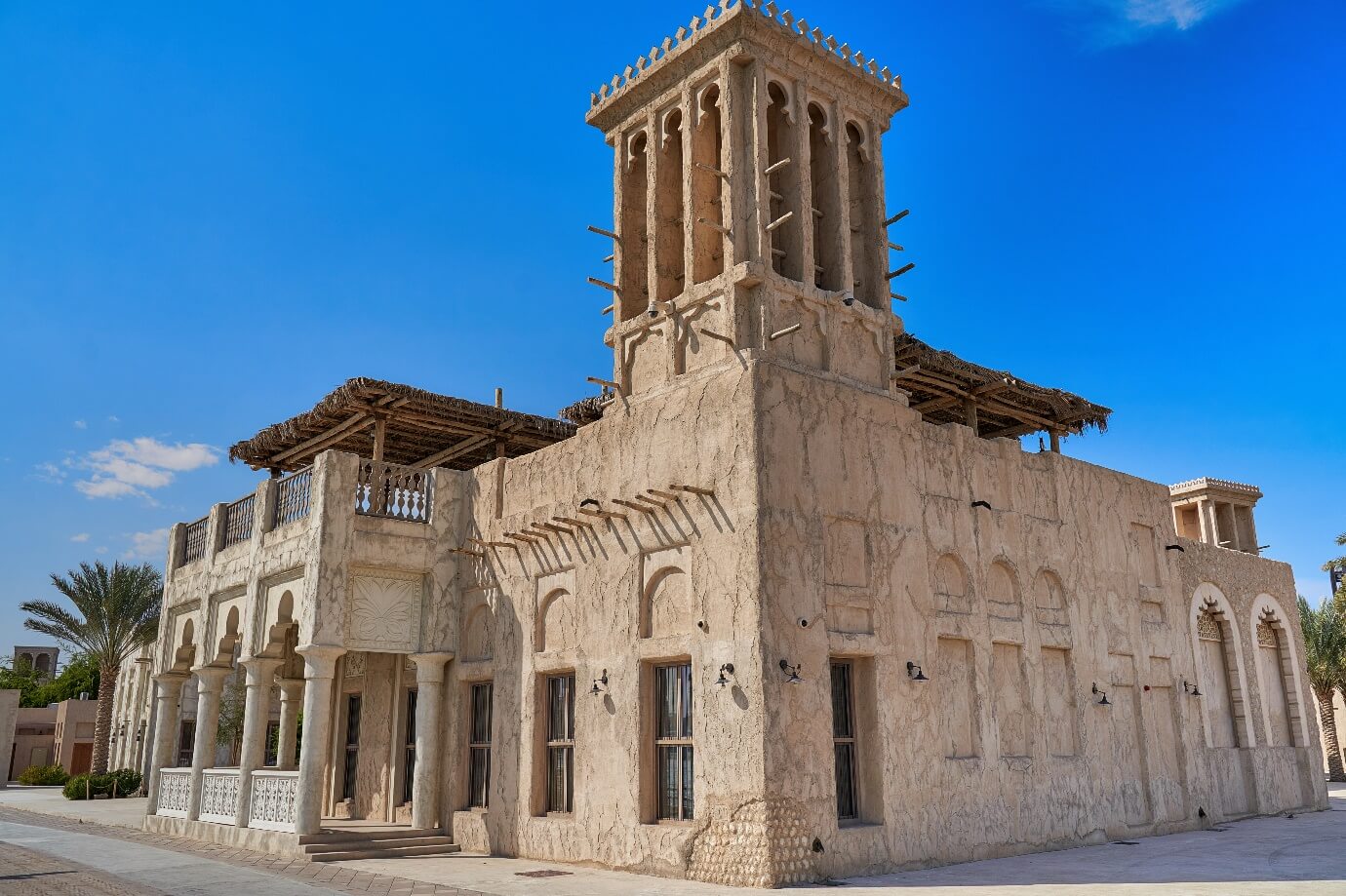 Old Dubai of buildings and traditional Arabian streets. Historical Al Fahidi neighborhood, Al Bastakiya in Dubai.